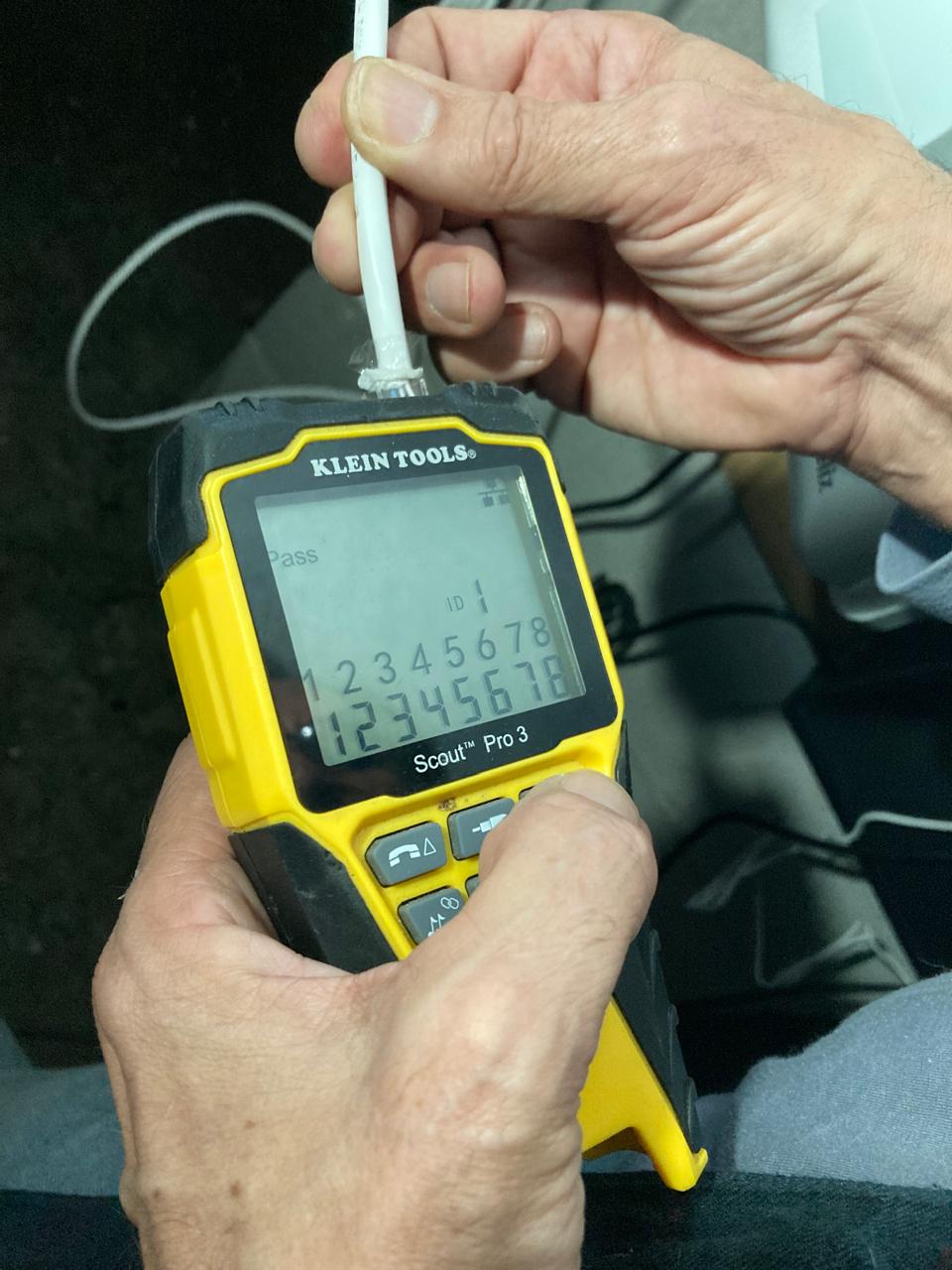 Testing a network cable with a handheld cable tester